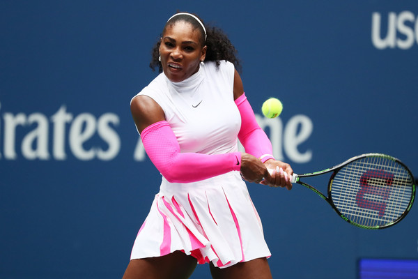 Williams competing against Larsson in the Arthur Ashe Stadium (Photo by Al Bello / Getty Images)