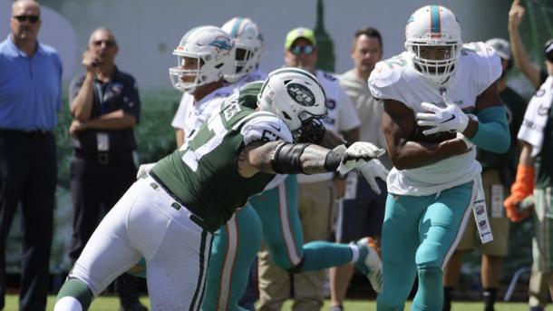 McDonald had the Dolphins' first interception of the game/Photo: Bill Kostroun/Associated Press