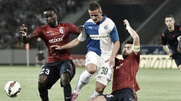 Shani Tarashaj (centre) in action in a Champions League qualifier against Lille. (Image: Sky Sports)
