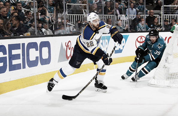 Kevin Shattenkirk #22 of the St. Louis Blues skates with control of the puck against Logan Couture #39 of the San Jose Sharks in Game Six of the Western Conference Finals during the 2016 NHL Stanley Cup Playoffs at SAP Center on May 25, 2016 in San Jose, California. (Photo by Rocky W. Widner/NHL/Getty Images)