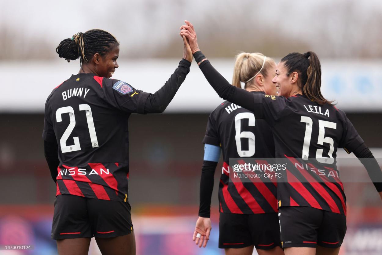 Khadija Shaw of Man City celebrates with teammate Leila Ouahabi after scoring the team first goal of the game during the FA Women's Super League match between Brighton & <strong><a  data-cke-saved-href='https://www.vavel.com/en/football/2023/03/07/womens-football/1139876-4-things-we-learned-from-chelseas-victory-over-brighton.html' href='https://www.vavel.com/en/football/2023/03/07/womens-football/1139876-4-things-we-learned-from-chelseas-victory-over-brighton.html'>Hove Albion</a></strong> and <strong><a  data-cke-saved-href='https://www.vavel.com/en/football/2023/03/05/womens-football/1139688-arsenal-vs-liverpool-womens-super-league-preview-2023.html' href='https://www.vavel.com/en/football/2023/03/05/womens-football/1139688-arsenal-vs-liverpool-womens-super-league-preview-2023.html'>Manchester City.</a></strong> (Photo by <strong><a  data-cke-saved-href='https://www.vavel.com/en/football/2023/03/16/manchester-city/1140863-julian-alvarez-signs-extended-contract-with-manchester-city.html' href='https://www.vavel.com/en/football/2023/03/16/manchester-city/1140863-julian-alvarez-signs-extended-contract-with-manchester-city.html'>Manchester City</a></strong> FC/<strong><a  data-cke-saved-href='https://www.vavel.com/en/international-football/2023/03/16/1140850-gareth-southgate-laments-english-squad-depth-deteriorating-rapidly-in-premier-league-after-picking-three-lions-squad.html' href='https://www.vavel.com/en/international-football/2023/03/16/1140850-gareth-southgate-laments-english-squad-depth-deteriorating-rapidly-in-premier-league-after-picking-three-lions-squad.html'>Manchester City</a></strong> FC via Getty Images)
