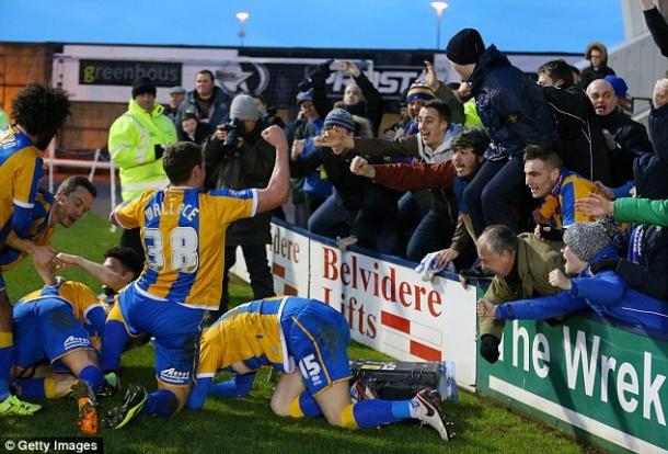 Shrewsbury celebrate their winning goal against Sheffield Wednesday (photo: Getty Images)