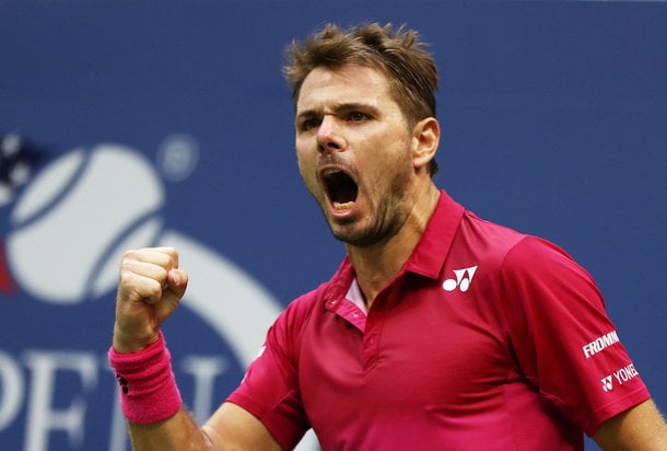 Wawrinka celebrates winning a point (Photo by Elsa/Getty Images)