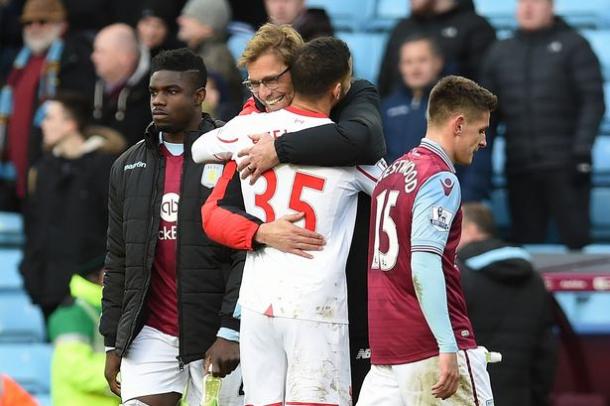 A delighted Klopp greets Stewart after making his league debut at Villa. (Picture: Getty Images)