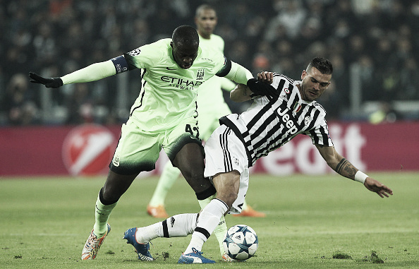 Sturaro battles with Manchester City's Yaya Toure | Photo: Marco Luzzani (Getty)