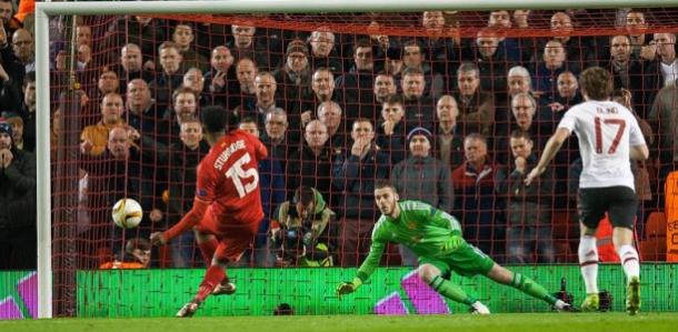 Daniel Sturridge scores Liverpool's first from the penalty spot as the United players can only watch on | Photo: Getty Images