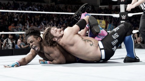 AJ Styles performing the Calf Crushes on Xavier Woods (image:f4wonline.com)