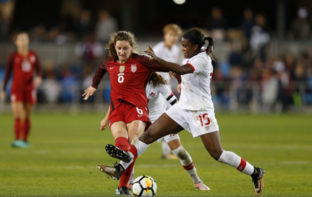 Sullivan (6) battles with Canada's Nichelle Prince (15) in the USWNT's final game of 2017; a 3-1 victory. | Photo: Lachlan Cunningham - Getty Images