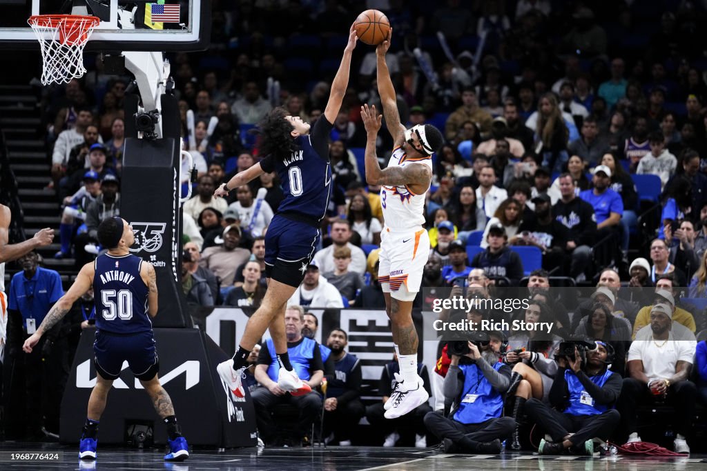 Anthony Black #0 of the Orlando Magic blocks a shot by <strong><a  data-cke-saved-href='https://www.vavel.com/en-us/nba/2023/11/07/1162111-disappointed-with-the-phoenix-suns-project.html' href='https://www.vavel.com/en-us/nba/2023/11/07/1162111-disappointed-with-the-phoenix-suns-project.html'>Bradley Beal</a></strong> #3 of the Phoenix Suns during the fourth quarter at Kia Center on January 28, 2024 in Orlando, Florida. NOTE TO USER: User expressly acknowledges and agrees that, by downloading and or using this photograph, User is consenting to the terms and conditions of the Getty Images License Agreement. (Photo by Rich Storry/Getty Images)