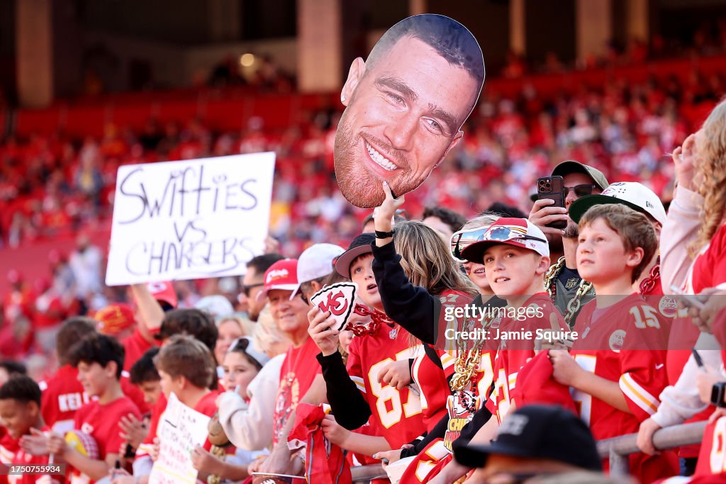  Kansas City Chiefs fans hold a Travis Kelce #87 sign before the game against the Los Angeles Chargers at GEHA Field at Arrowhead Stadium on October 22, 2023 in Kansas City, Missouri. (Photo by Jamie Squire/Getty Images)