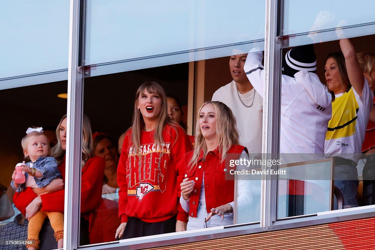 Taylor Swift and Brittany Mahomes react to a touchdown scored by Travis Kelce #87 of the Kansas City Chiefs during the second quarter of the game against the Los Angeles Chargers at GEHA Field at Arrowhead Stadium on October 22, 2023 in Kansas City, Missouri. (Photo by David Eulitt/Getty Images)