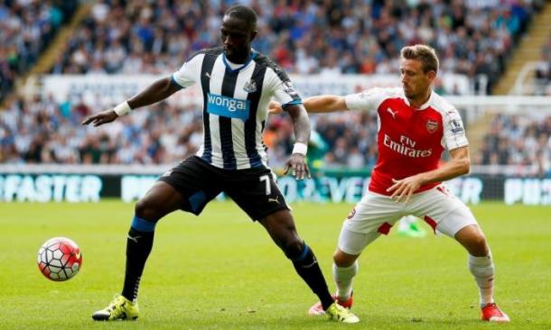 Sissoko battles with Monreal. | Source: talksport