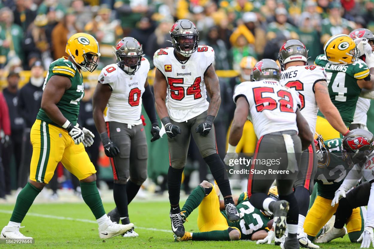 Lavonte David #54 of the <strong><a  data-cke-saved-href='https://www.vavel.com/en-us/nfl/2022/01/23/1099396-bucs-fall-short-in-late-game-comeback-as-rams-reach-nfc-championship.html' href='https://www.vavel.com/en-us/nfl/2022/01/23/1099396-bucs-fall-short-in-late-game-comeback-as-rams-reach-nfc-championship.html'>Tampa Bay</a></strong> Buccaneers reacts after a play during the third quarter against the <strong><a  data-cke-saved-href='https://www.vavel.com/en-us/nfl/2023/08/08/1152923-2023-nfl-season-preview-afc-west.html' href='https://www.vavel.com/en-us/nfl/2023/08/08/1152923-2023-nfl-season-preview-afc-west.html'>Green Bay</a></strong> Packers at Lambeau Field on December 17, 2023 in Green Bay, Wisconsin. (Photo by Stacy Revere/Getty Images)