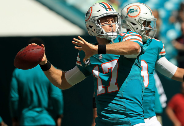 Ryan Tannehill has to be taken care of by the defensive line, or he could hurt the Jets in the air. Credit: Mike Ehrmann/Getty Images North America