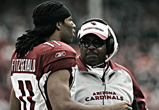 Arizona Cardinals' head coach Dennis Green, right, talks with Larry Fitzgerald in the first quarter of an NFL football game against the San Francisco 49ers in San Francisco. (AP Photo/Jeff Chiu)
