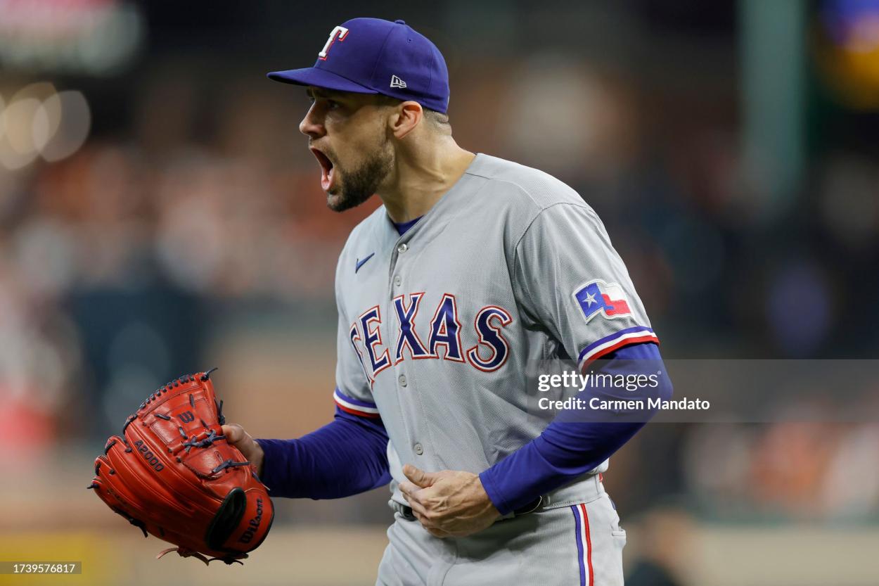Nathan Eovaldi #17 of the Texas Rangers celebrates an out against the Houston Astros to end the fifth inning in Game Two of the American League Championship Series at Minute Maid Park on October 16, 2023 in Houston, Texas. (Photo by Carmen Mandato/Getty Images)