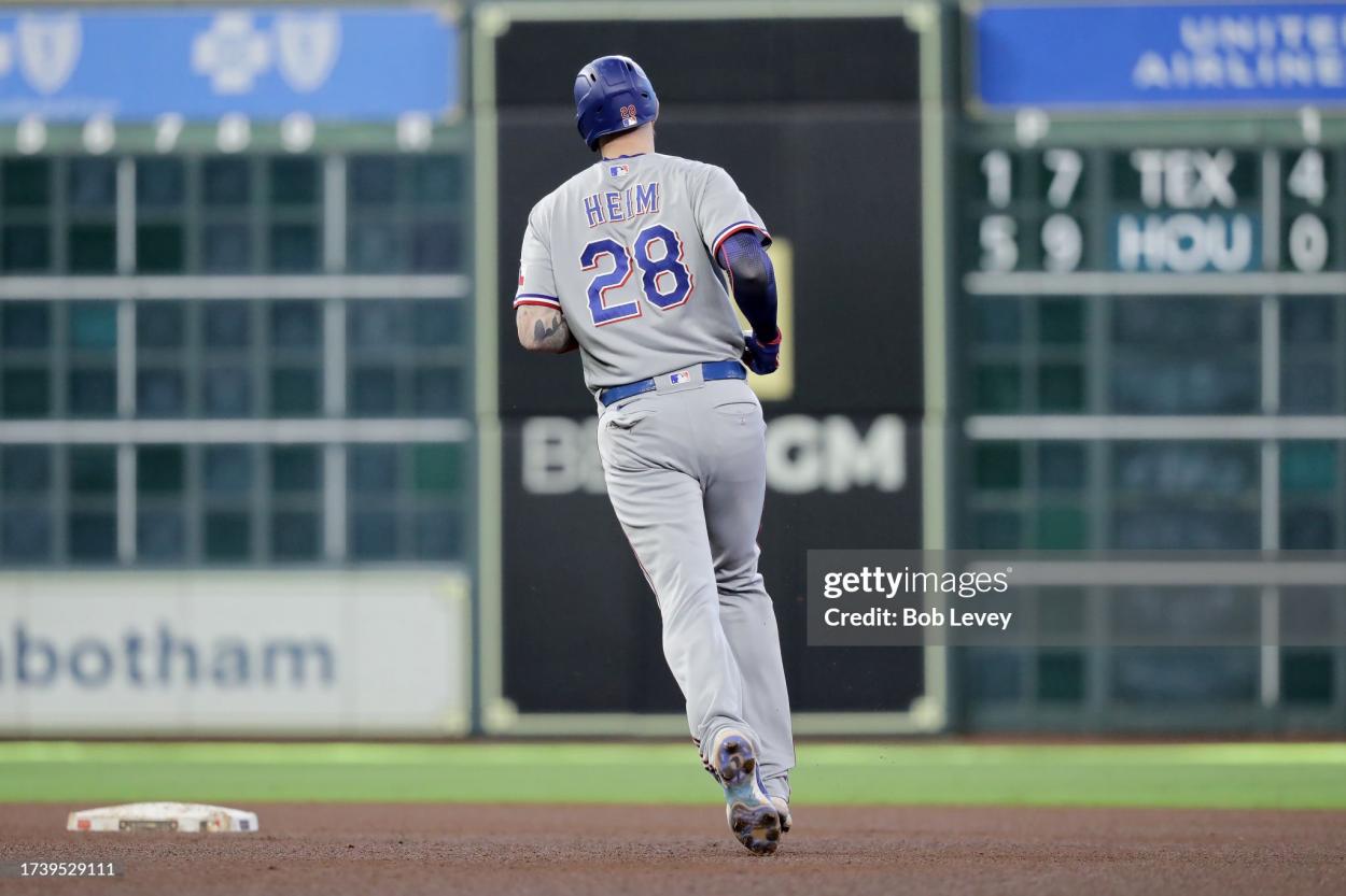 Jonah Heim #28 of the Texas Rangers rounds the bases after hitting a solo home run against Framber Valdez #59 of the Houston Astros during the third inning in Game Two of the American League Championship Series at Minute Maid Park on October 16, 2023 in Houston, Texas. (Photo by Bob Levey/Getty Images)
