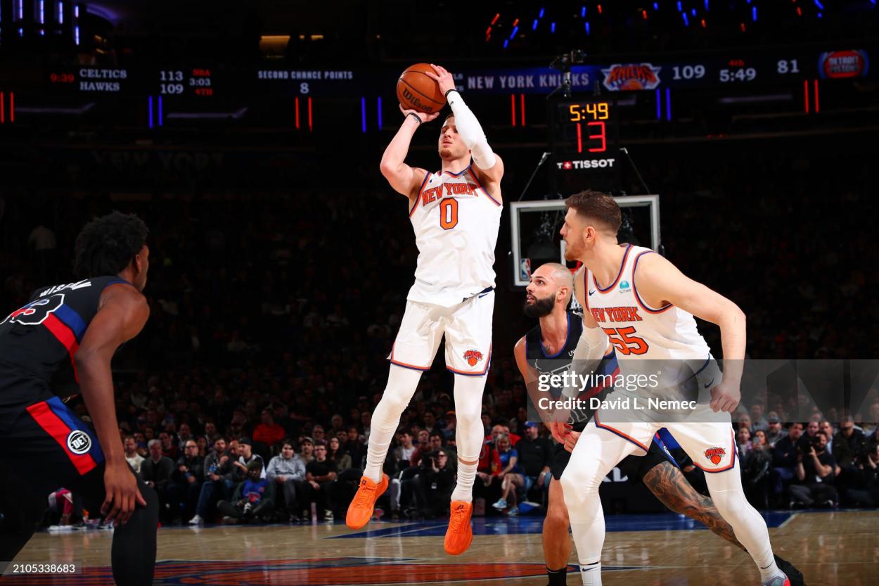 Donte Divincenzo #0 of the New York Knicks shoots a three point basket during the game against the Detroit Pistons on March 25, 2024 at <strong><a  data-cke-saved-href='https://www.vavel.com/en-us/nba/2024/02/25/1173840-the-boston-celtics-win-their-eighth-game-in-a-row.html' href='https://www.vavel.com/en-us/nba/2024/02/25/1173840-the-boston-celtics-win-their-eighth-game-in-a-row.html'>Madison Square Garden</a></strong> in New York City, New York. NOTE TO USER: User expressly acknowledges and agrees that, by downloading and or using this photograph, User is consenting to the terms and conditions of the Getty Images License Agreement. Mandatory Copyright Notice: Copyright 2024 NBAE (Photo by David L. Nemec /NBAE via Getty Images)