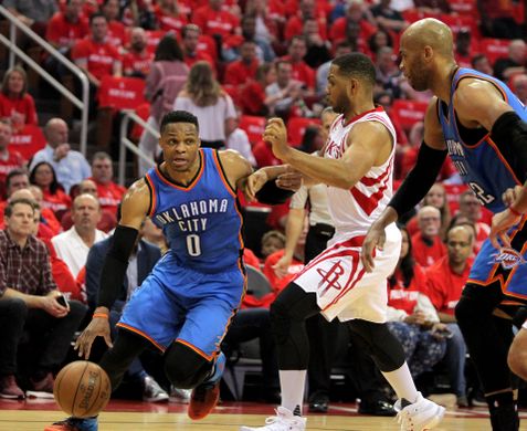 Oklahoma City Thunder guard Russell Westbrook (0) drives to the rim past Houston Rockets guard Eric Gordon (10). Photo by: Erik Williams-USA TODAY Sports 