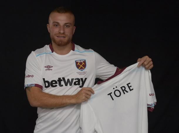 Above: Gokan Tore been unveiled as a West Ham player | Photo: whufc.com