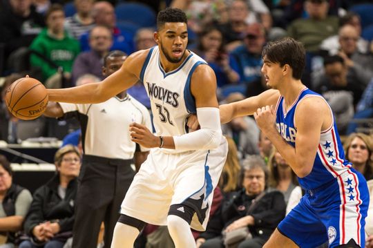 Karl-Anthony Towns (left) posts up Dario Saric. PHOTO: Brace Hemmelgran/USA Today Sports