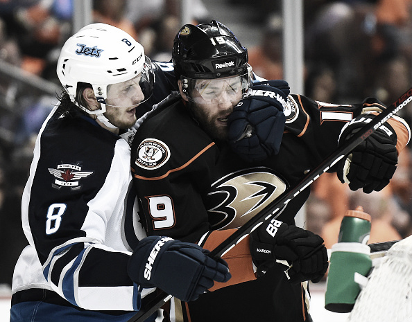 Jacob Trouba #8 of the Winnipeg Jets grabs Patrick Maroon #19 of the Anaheim Ducks in front of the net during the first period in Game One of the Western Conference Quarterfinals during the 2015 NHL Stanley Cup Playoffs at Honda Center on April 16, 2015 in Anaheim, California. (Photo by Harry How/Getty Images)