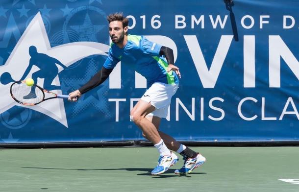 Marcel Granollers stretches out for forehand in ITC final. (Photo Credit: Tara Kramer Photography)