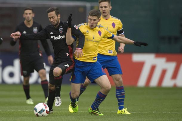 D.C. will need Marcelo Sarvas (Left) to win challenges in the midfield against the Revs on Saturday. Photo provided USA TODAY Sports.  