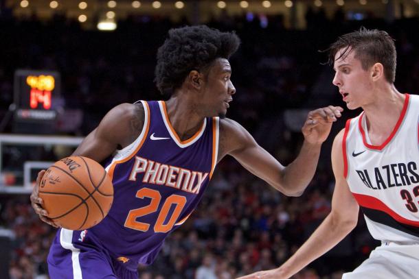 Phoenix Suns forward Josh Jackson (20) drives past Portland Trail Blazers center Zach Collins (33). |Source - Craig Mitchelldyer/USA TODAY Sports|