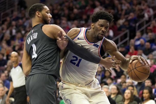 Philadelphia 76ers center Joel Embiid (21) drives against Brooklyn Nets center Jahlil Okafor (4) during the third quarter at Wells Fargo Center. |Bill Streicher-USA TODAY Sports|