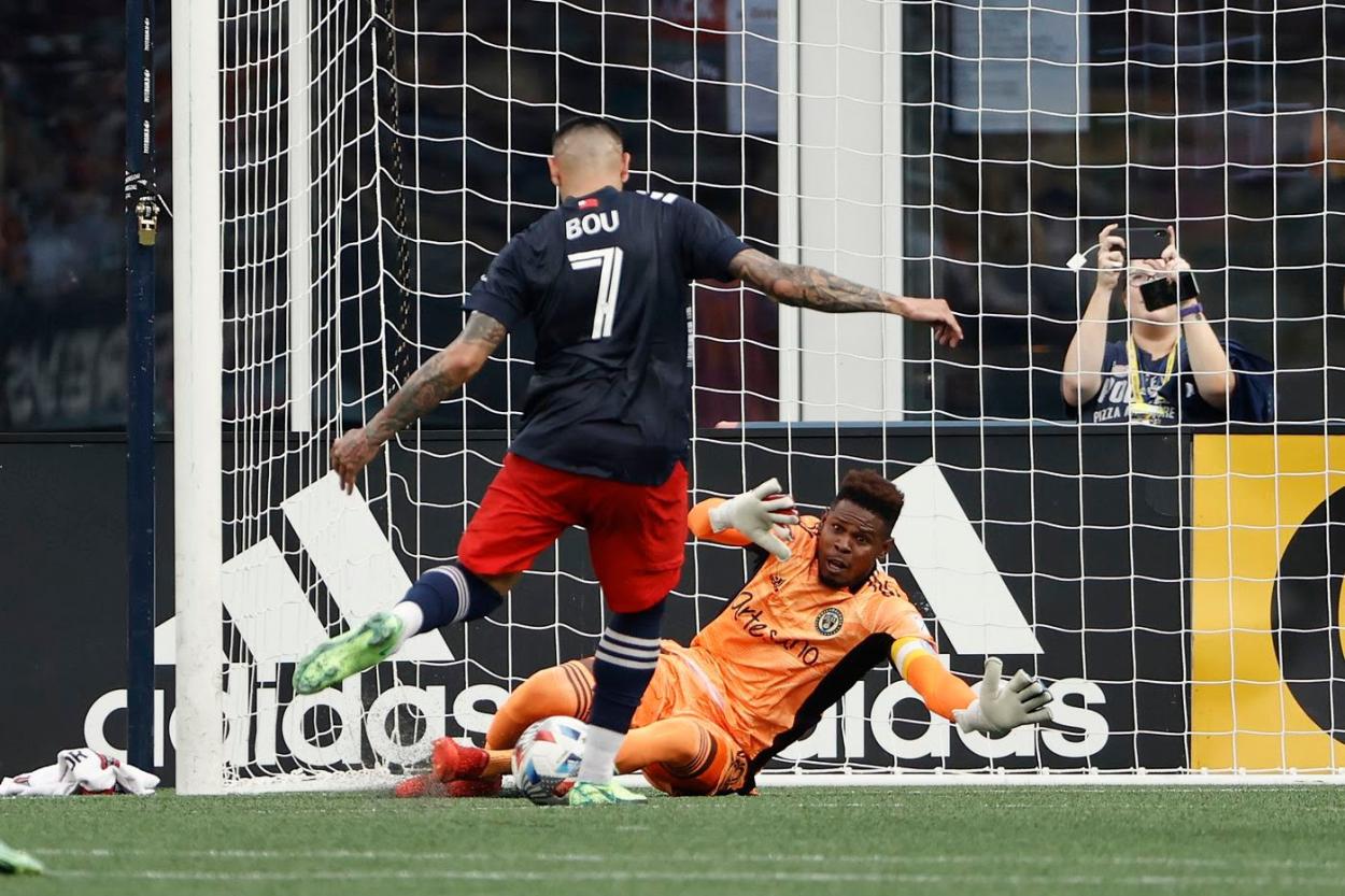 Bou finishes past Blake on the rebound of his penalty/Photo: Winslow Townson/USA Today Sports