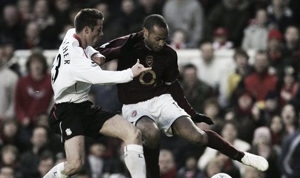 Carragher versus Henry during one of their many battles (image: express.co.uk)