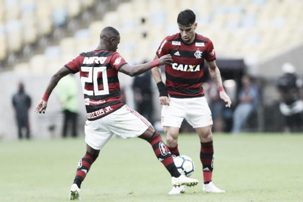As joias Vinicius Jr. e Lucas Paquetá estão confirmadas para o Fla-Flu. Foto: Gilvan de Souza/Flamengo
