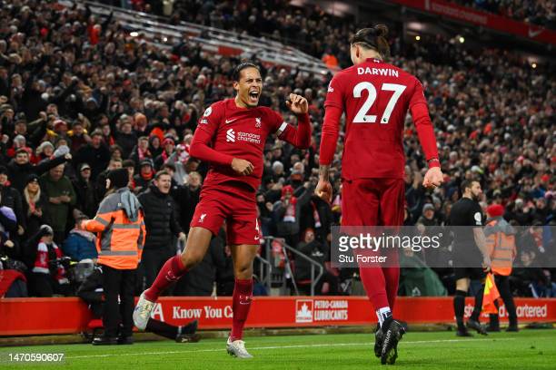 Virgil van Dijk of Liverpool celebrates with teammate <strong><a  data-cke-saved-href='https://www.vavel.com/en/football/2023/02/26/premier-league/1138909-four-things-we-learnt-from-crystal-palaces-draw-with-liverpool.html' href='https://www.vavel.com/en/football/2023/02/26/premier-league/1138909-four-things-we-learnt-from-crystal-palaces-draw-with-liverpool.html'>Darwin Nunez</a></strong> after scoring the team's first goal during the <b><a  data-cke-saved-href='https://www.vavel.com/en/data/premier-league' href='https://www.vavel.com/en/data/premier-league'>Premier League</a></b> match between Liverpool FC and Wolverhampton Wanderers at Anfield on March 01, 2023 in Liverpool, England. (Photo by Stu Forster/Getty Images)