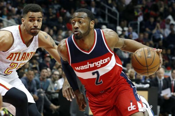 Washington's John Wall drives past Atlanta's Thabo Sefolosha. | Jason Getz - USA TODAY Sports