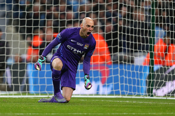 Caballero (pictured) celebrates one of his three penalty saves, helping City to victory dramatically | Photo: Getty