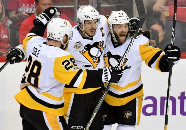 Rust (r.) celebrates his goal with Crosby (c.) and Ian Cole (l.) that gave the Penguins a 1-0 lead/Photo: Matt Freed/Pittsburgh Post-Gazette