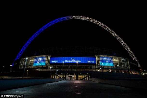 Via Daily Mail. Wembley's arch shows the Blue of Chelsea and the white of Tottenham before the 2015 Capital One Cup Final.