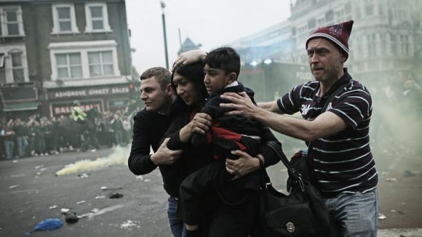 Above: People flee the chaos before West Ham United's 3-2 victory over Manchester United | Photo: Sky Sports 