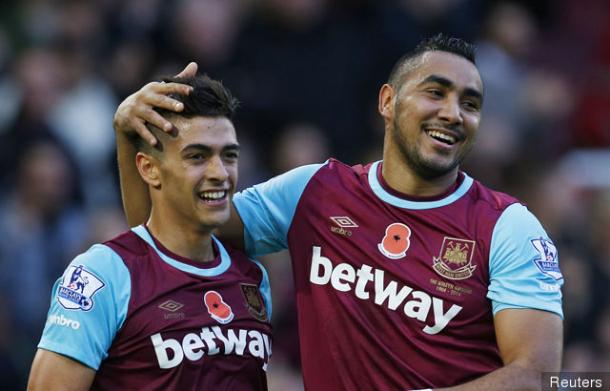 Above: Manuel Lanzini and Dimitri Payet in action for West Ham last season | Photo: Getty Images 