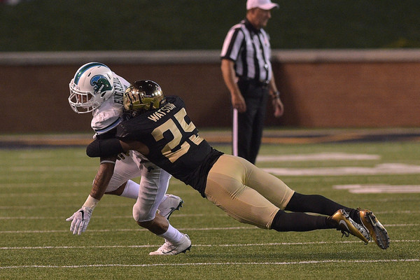 Brad Watson (25) makes a tackie in Wake Forest's game against Tulane | Source: Lance King - Getty Images