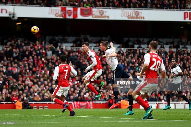 Kevin Wimmer scores an own goal for Arsenals first during the Premier League match between Arsenal and Tottenham Hotspur. | Photo: Clive Rose/Getty Images