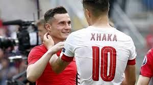 Shirt swap? The Xhaka brothers meet up on the pitch after the game | Image: getty images