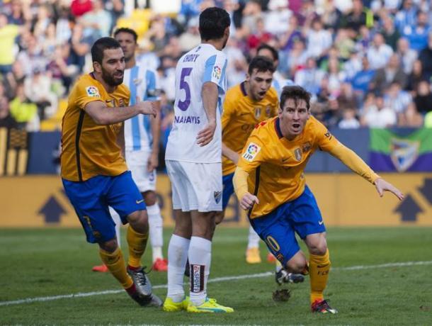 Messi celebrating his goal against Malaga. Photo: DANIEL TEJEDOR - AP