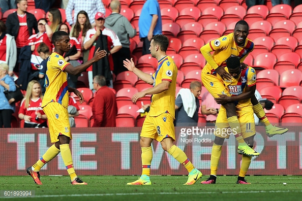 Crystal Palace players celebrate their sides second and deciding goal at the Riverside Stadium | Photo: Getty