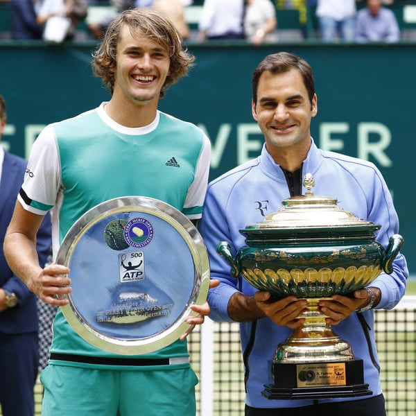 Federer (right) gained his revenge against Zverev (left) after the lanky German defeated him in the semifinals last year (Photo by Joachim Sielski / Bongarts