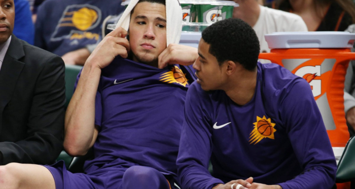 Phoenix Suns guard Devin Booker (1) talks with guard Tyler Ulis (8) on the bench during a game against the Indiana Pacers. |Brian Spurlock-USA TODAY Sports|