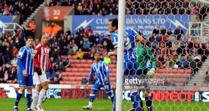 STOKE ON TRENT, ENGLAND - FEBRUARY 19: Gordon Greer of Brighton heads the ball clear off the line during the FA Cup sponsored by E.ON 5th Round match between Stoke City and Brighton & Hove Albion at Britannia Stadium on February 19, 2011 in Stoke on T