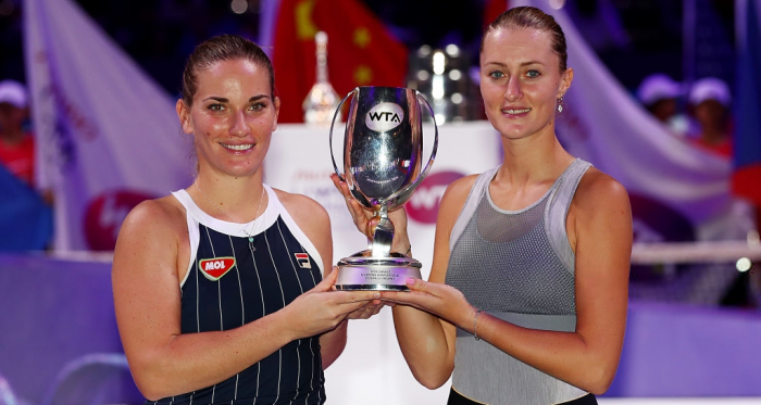 Babos and Mladenovic with their title | Photo: Clive Brunskill