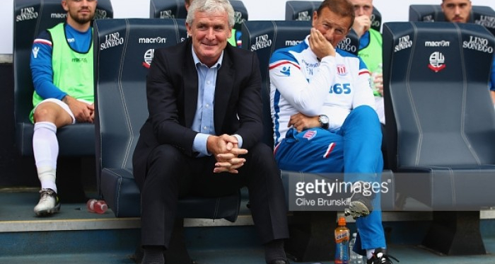 Mark Hughes looks on to Everton for the first game of the Premier League